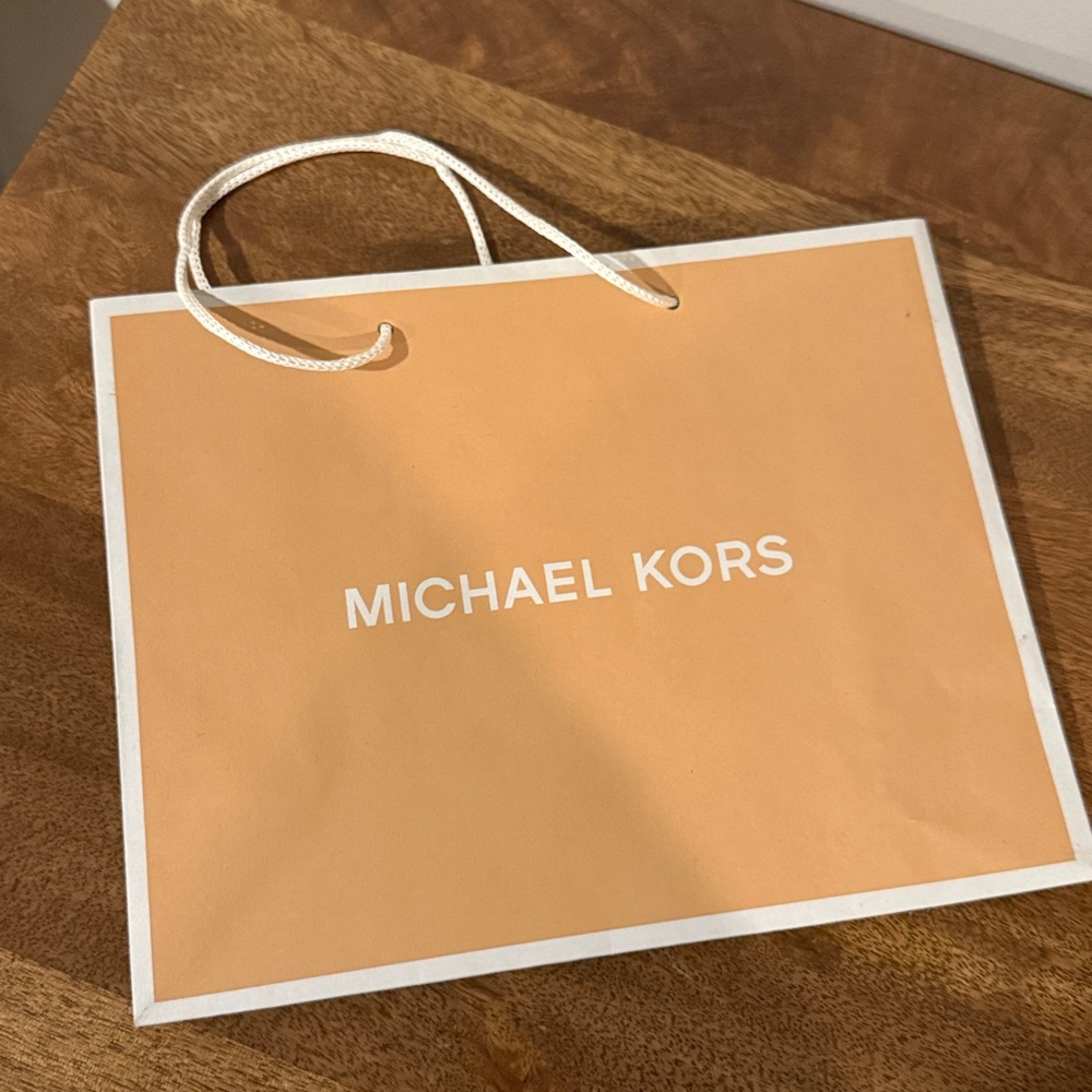 Authentic Michael Kors gift bag. 10 x 8 in. New, never used. Great for gifting